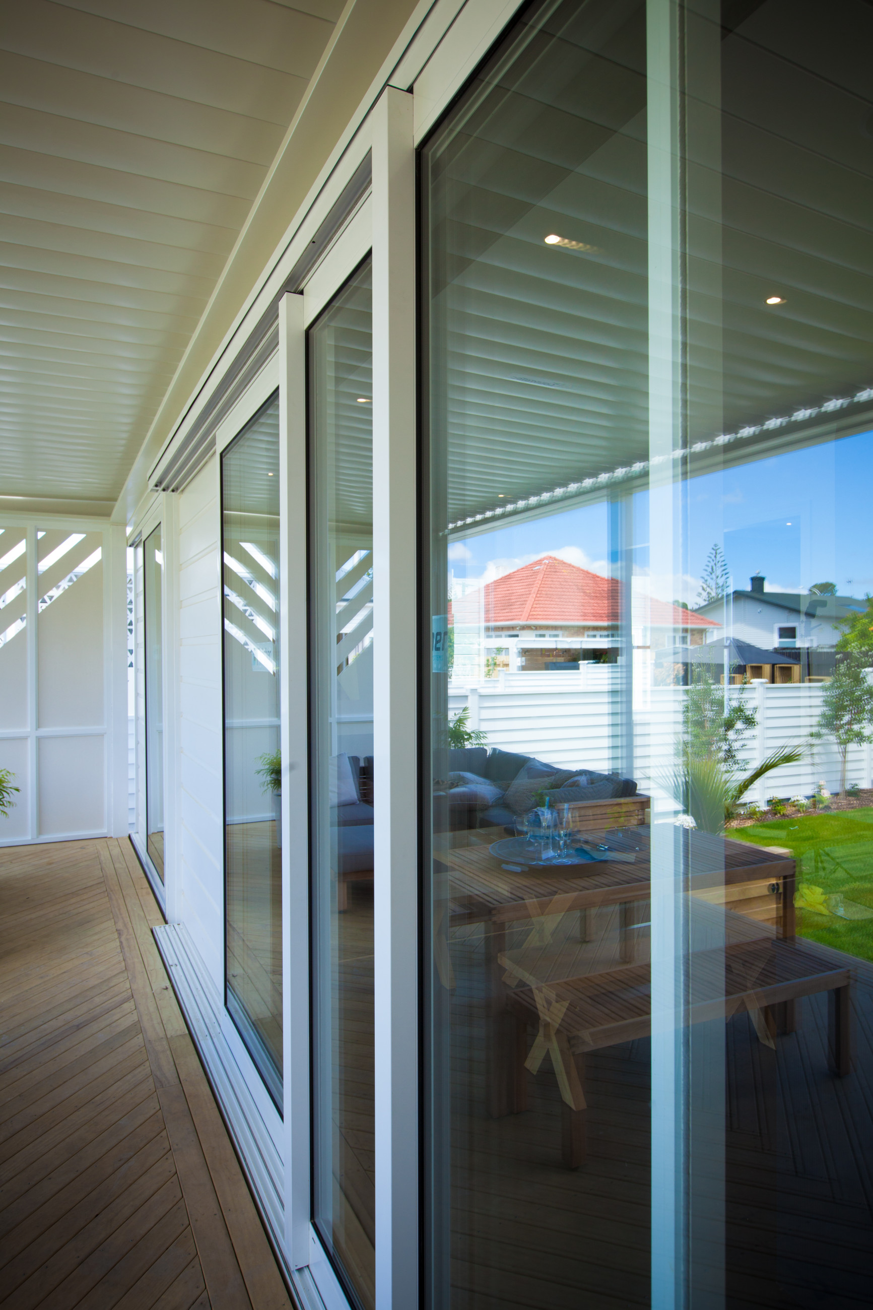 Modern home exterior with double windows and doors