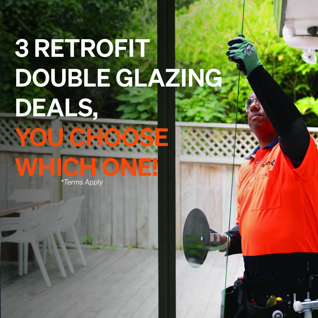 Retrofit double glazing specialist installing glass in an existing residential window as part of a promotion offering three retrofit double glazing deals for New Zealand homeowners.